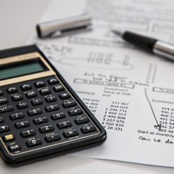 Calculator on page of financial numbers